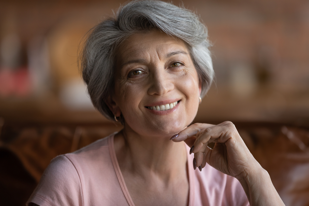older woman smiling --Crown Lengthening Dentist in Detroit, MI