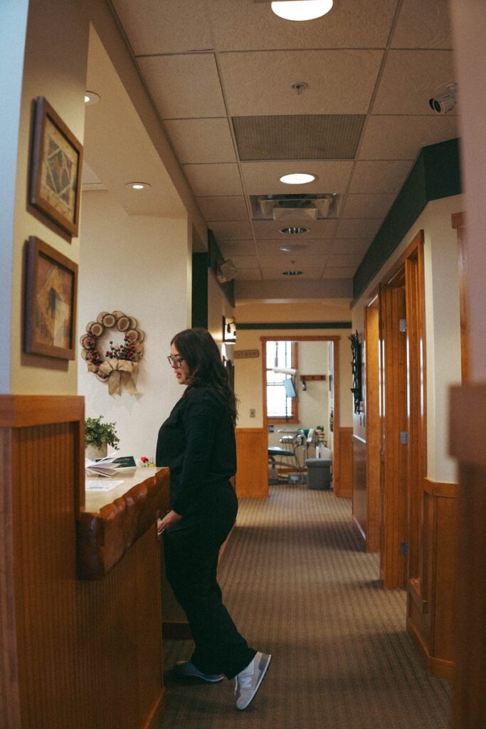 Team member at the front desk of Parkside Dental Team