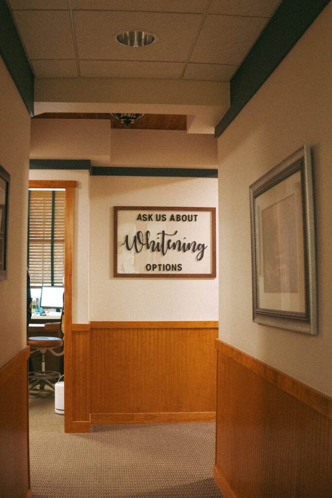 Hallway with teeth whitening sign at Parkside Dental Team